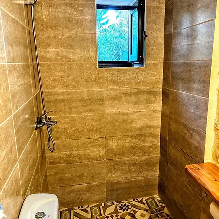 The Secret Ontas, Traditional Stone House *